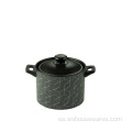 Plato de cacerola de cerámica negra con tapa